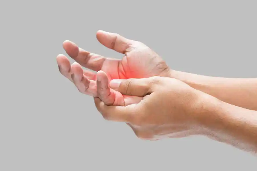 Reha Hand Gelenk und Finger: Darstellung einer schmerzenden Hand